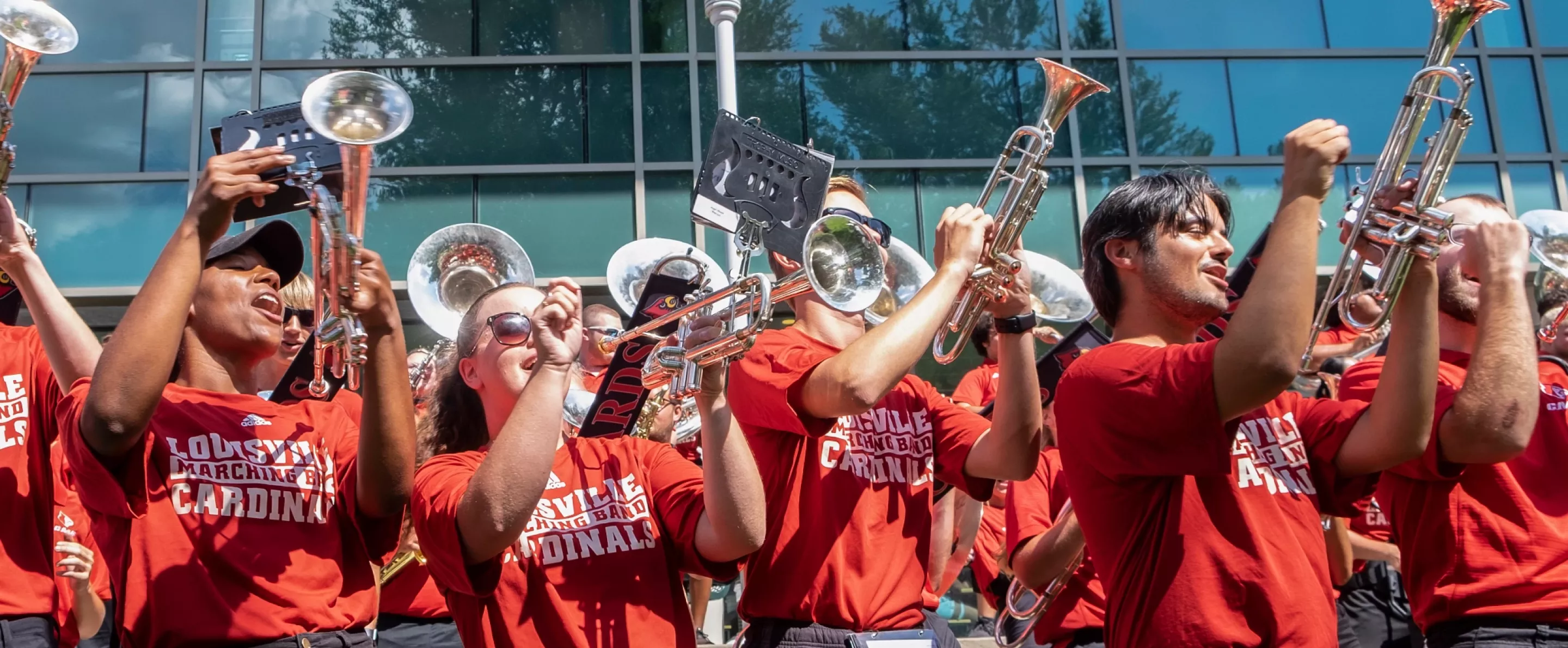Members of Cardinal Marching Band at the Alumni Picnic during Welcome Week.