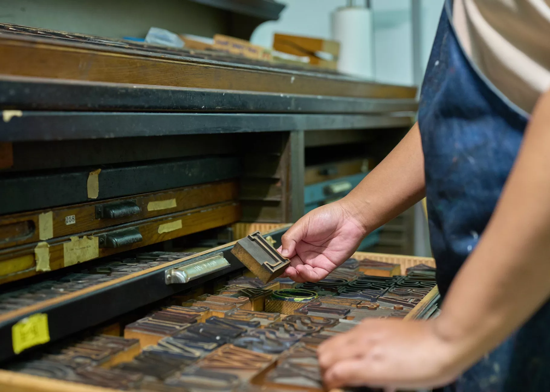 Close-up of moveable type blocks in the printmaking studio