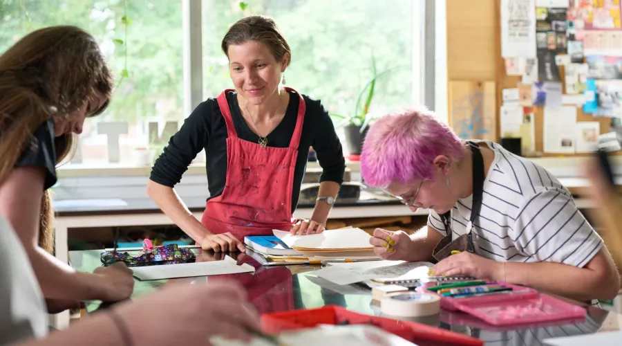 Rachel Singel, Associate Professor teaching a printmaking studio course