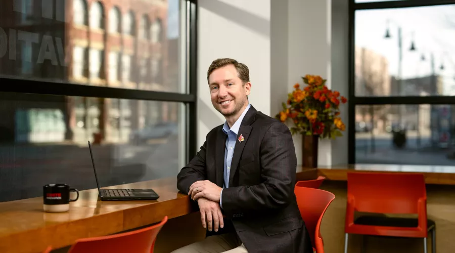 Will Metcalf sitting at a desk